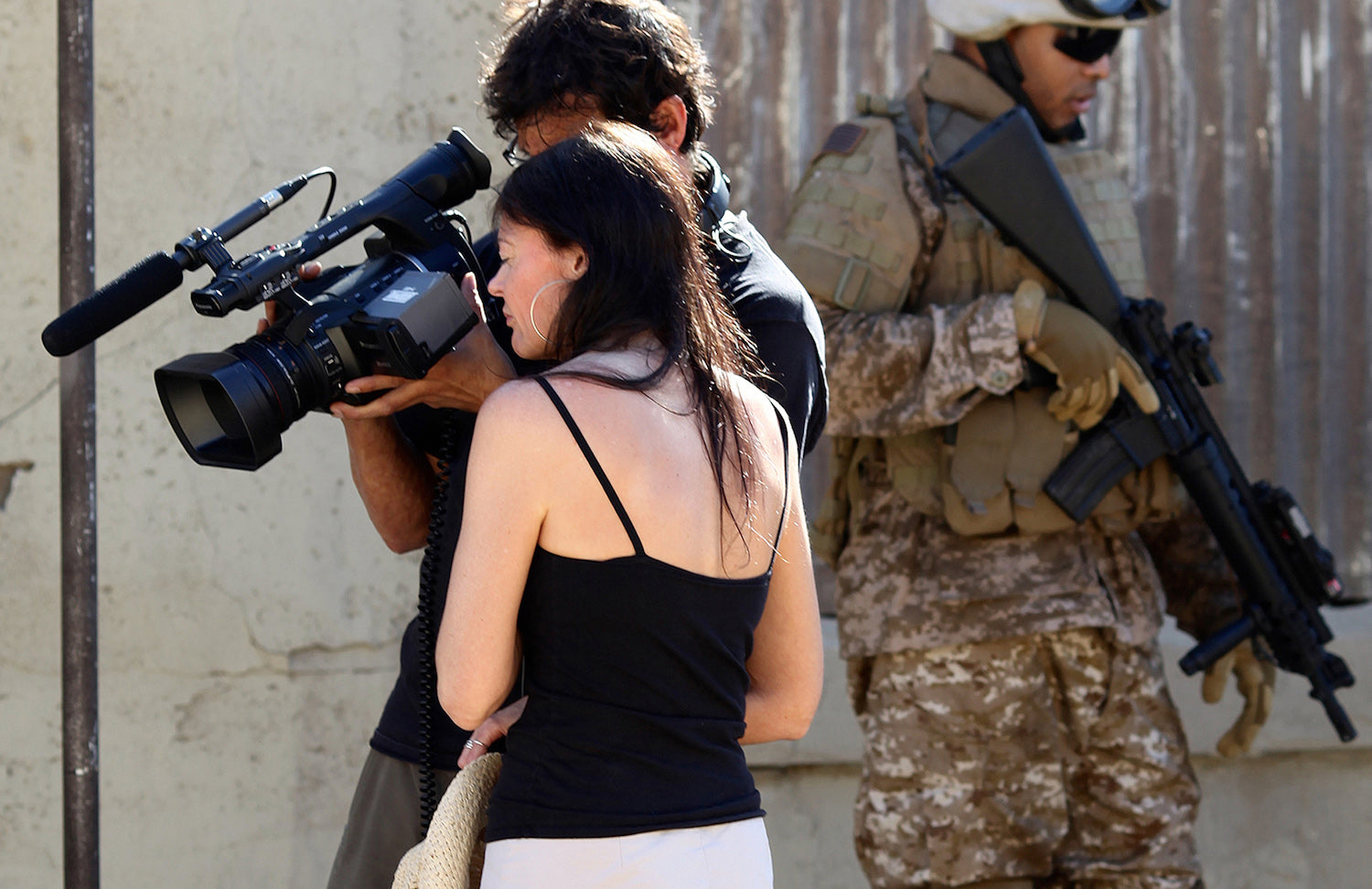 Battlefield Fallujah: About the Producer & Narrator Laura Cross - Image of Laura Cross on the set of Devil Dogs